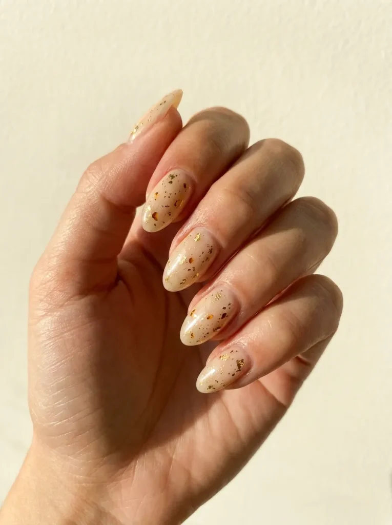 10. Golden Speckle Nails