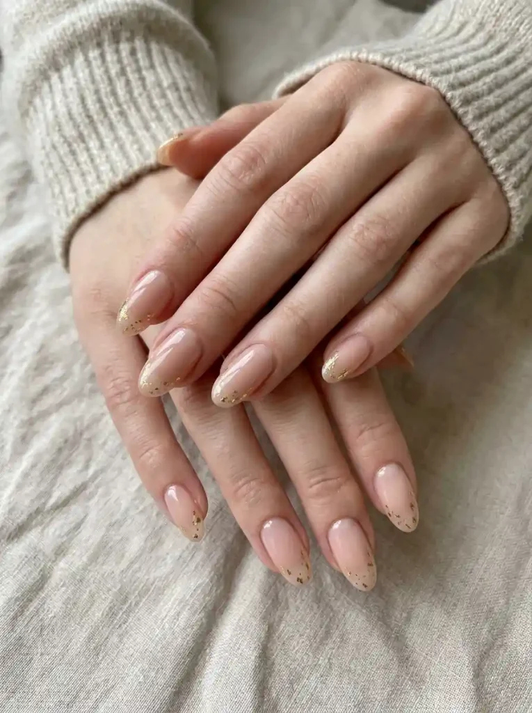 10. Nude Gold Foil Nails