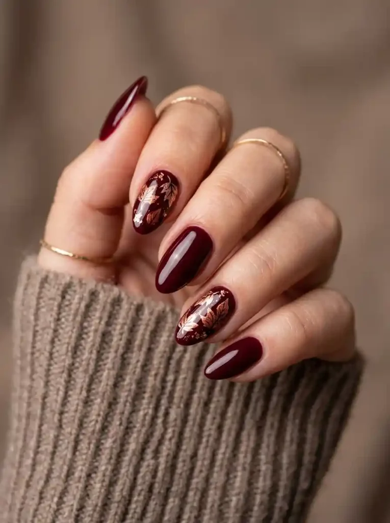 11. Burgundy Leaf Nails