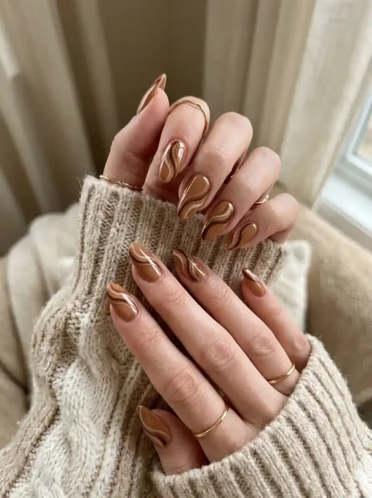 14. Caramel Swirl Nails