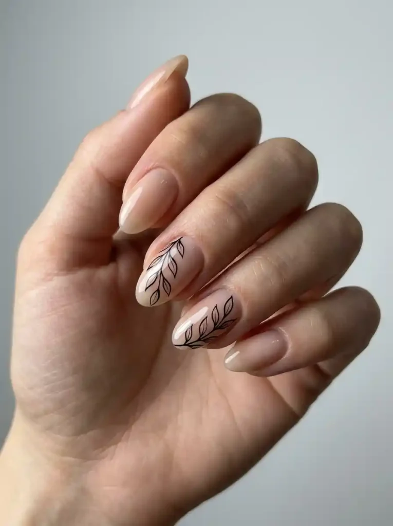 21. Black Leaf Negative Space Fall Leaf Nail Ideas